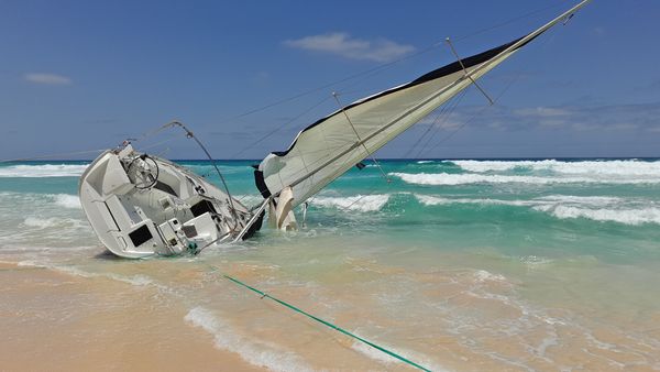 boat washed up on beach boat washed up on beach